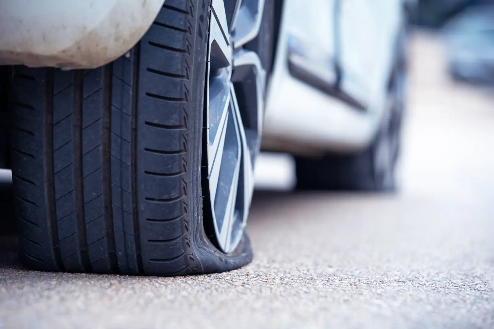 Mobile tyre fitter providing convenient tyre replacement service at customer's location in the UK